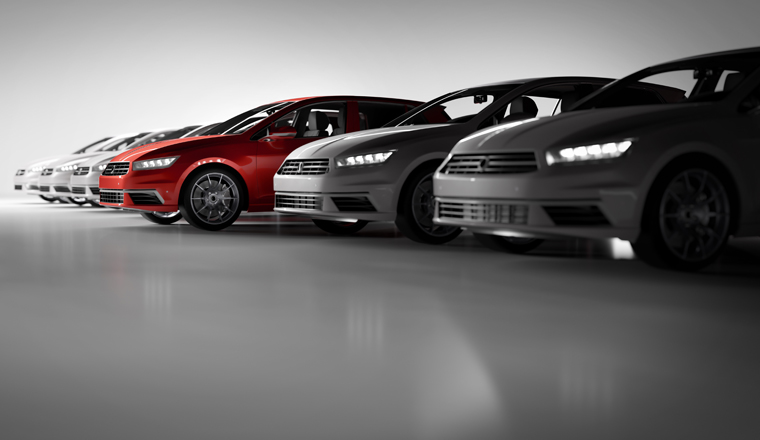 Compact cars fleet in the studio garage. A red one standing out. Choosing new car concept. Generic and brandless yet contemporary and elegant look. 3D illustration
