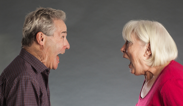 Senior couple, shouting at each other.