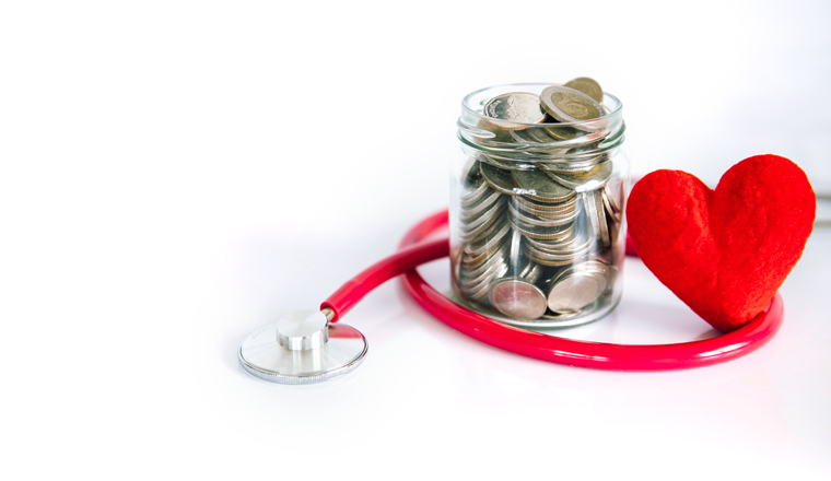 Health  insurance and Medical Healthcare heart disease concept , a red heart shape with stethoscope , financail healthcare