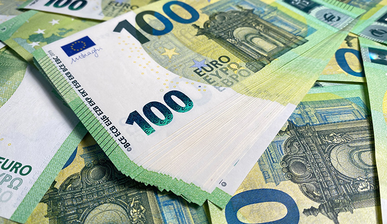 One hundred euros. The single currency of the European Union. 100 euro bills. European currency. Cash banknotes. Financial business background concept. Background of money.