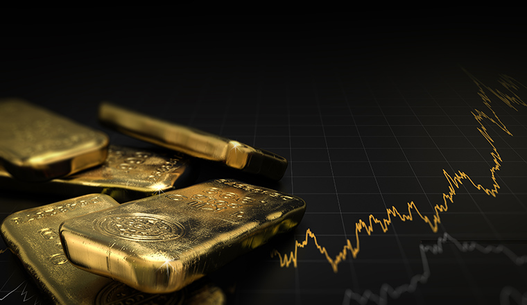 3D illustration of gold ingots over black background with a chart. Financial concept, horizontal image.