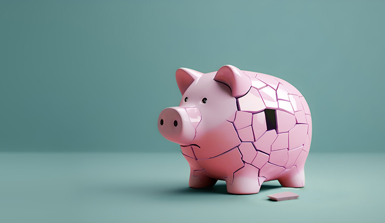Financial and Economic Crisis Concept. Inflation, Recession, Inflation and Depression affect Savings Money. Crackked Ceramic Piggy Bank standing alone against a Blue background. AI generative