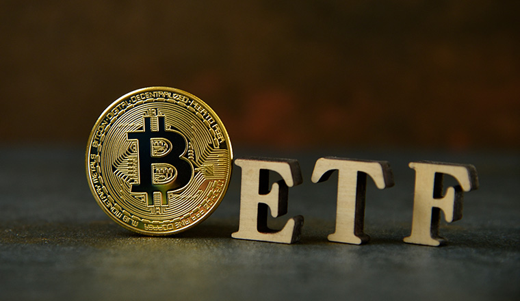 Bitcoin coin with ETF text  on stone background, Concept Entering the Digital Money Fund. ETF and Bitcoin cryptocurrency concept