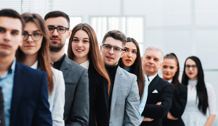 large group of diverse business people standing in a row. business concept