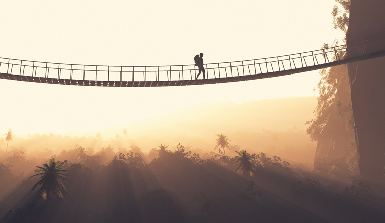 Man rope passing over a bridge suspended between mountains. This is a 3d render illustration.
