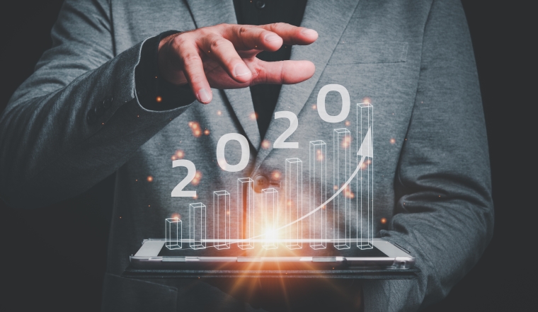 business analytics and financial technology concept, virtual screen chart from the screen of digital tablet computer.plans to increase business growth and an increase in the indicators of positive growth in 2020.