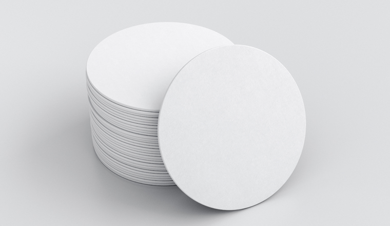 White round beer coasters on white background with clipping path around coasters. 3d illustration