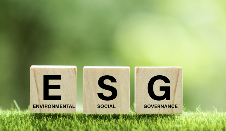 words ESG on a wood block and Future environmental conservation and sustainable ESG modernization development by using the technology of renewable resources to reduce pollution and carbon emission.