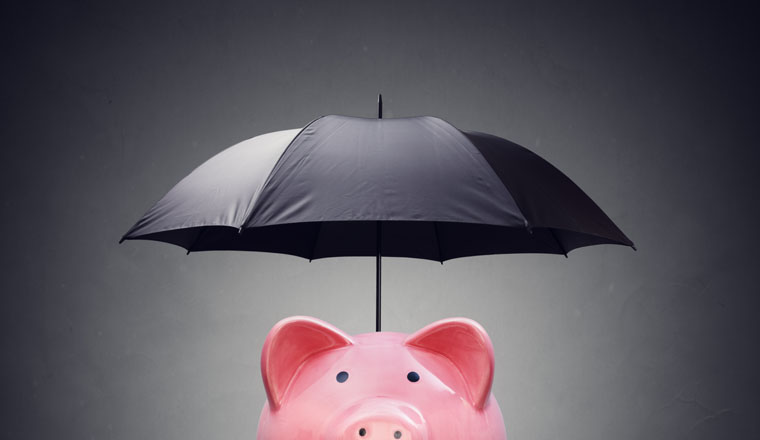 Piggy bank with umbrella concept for finance insurance, protection, safe investment or banking