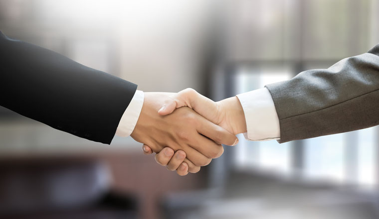 M&A (MERGERS AND ACQUISITIONS) , Businessman handshake working at office M&A