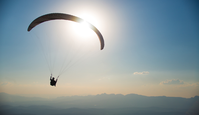 Paragliding into the sunset in Brazil