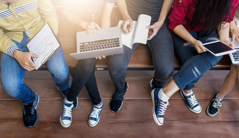 young people being used computer and tablet. education and technology concept