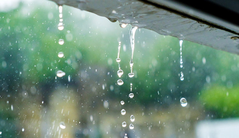 Rainwater drains off the roof.