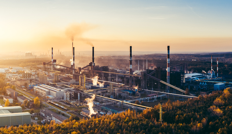 industrial landscape with heavy pollution produced by a large factory