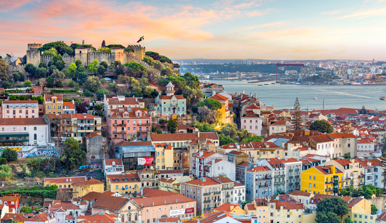 Lisbon, Portugal skyline at Sao Jorge Castle at sunset.