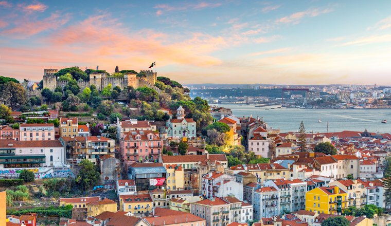 Lisbon, Portugal skyline at Sao Jorge Castle at sunset.