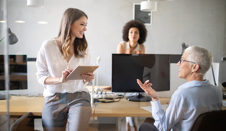 Successful group of business people at work in modern office