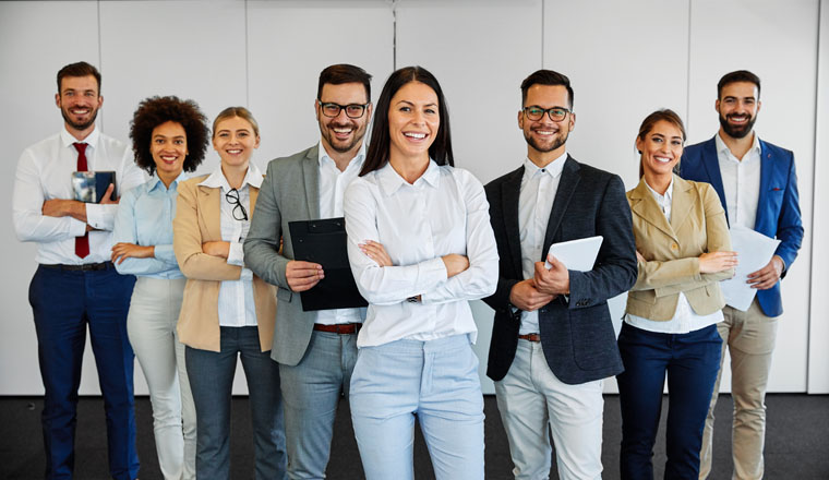 Portrait of succesful young business people team in the office