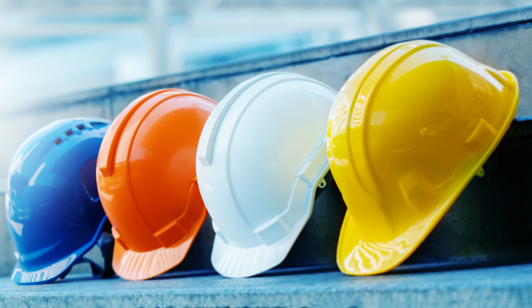 Multicolored Safety Construction Worker Hats. Teamwork of the construction team must have quality. Whether it is engineering, construction workers. Have a helmet to wear at work. For safety at work.