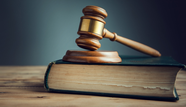 Symbols of the law on a rustic desk