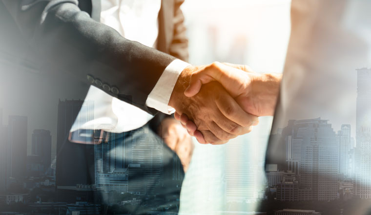 Businessman handshake for teamwork of business merger and acquisition,successful negotiate,hand shake,two businessman shake hand with partner to celebration partnership and business deal concept