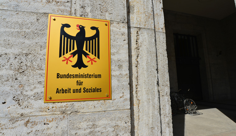 Berlin / Germany - June 15, 2014: Sign at the entrance to Federal Ministry of Labor and Social Affairs - BMAS - located in Wilhelmstrasse, Berlin, Germany