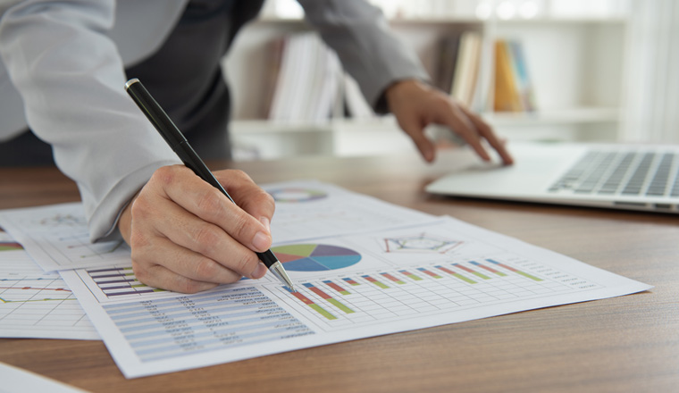 Businessman review assessment and evaluation of corporate for business restructuring. Business and Financial concept.
