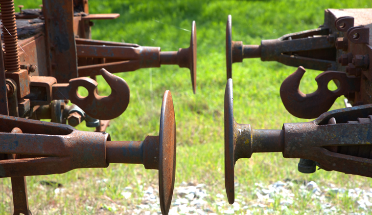 old train, in an abandoned station , parts from old wagon, old buffer in railway carriage, hook wagon