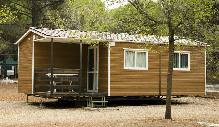 Mobile homes, brown bungalow in a camping.