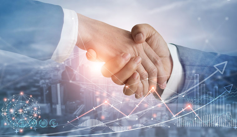 Business partners shake hands with growth graph network marketing icons. Global business partnership and successful collaboration agreement to achieve business strategy solutions, goals and target.