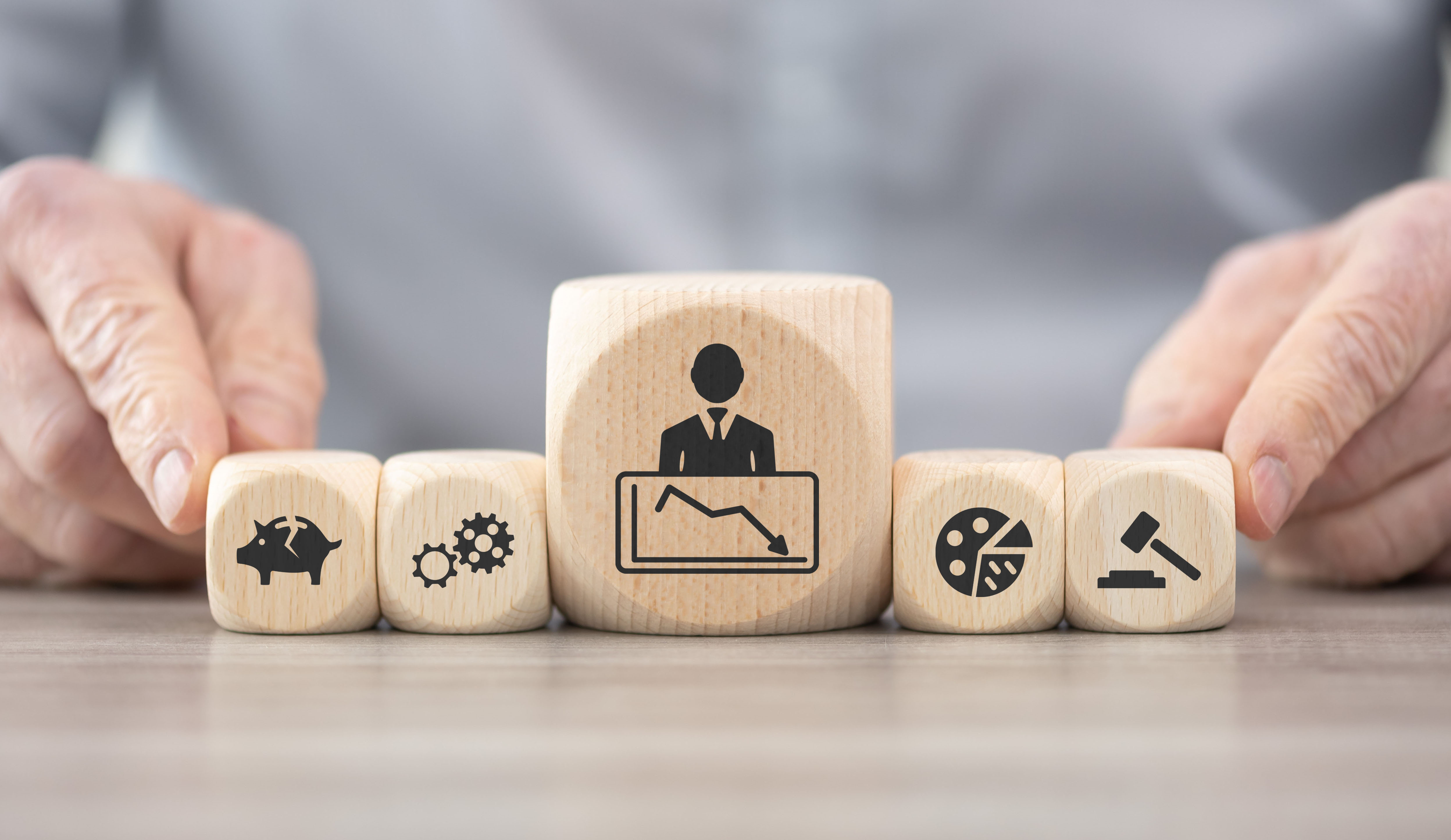 Wooden blocks with symbol of bankruptcy concept