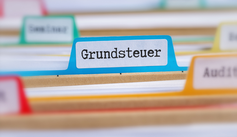 Akten mit der Beschriftung Grundsteuer