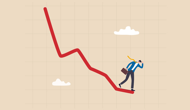 Economic recession, stock market plunge or falling down, cryptocurrency crash or financial crisis from inflation concept, businessman investor standing on falling down red graph look for bottom.