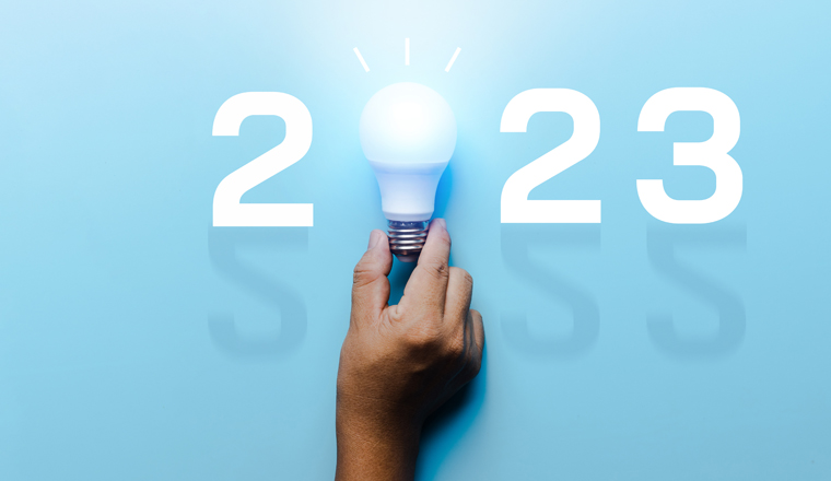Idea and creative in 2023, lighting bulb with new year number on blue background