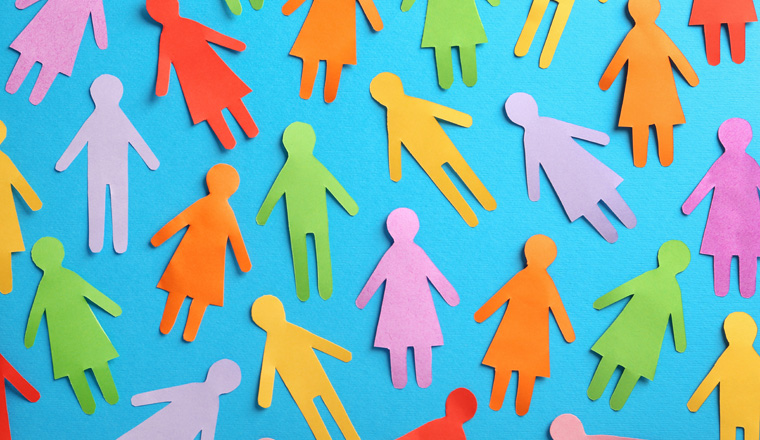 Many different paper human figures on light blue background, flat lay. Diversity and inclusion concept
