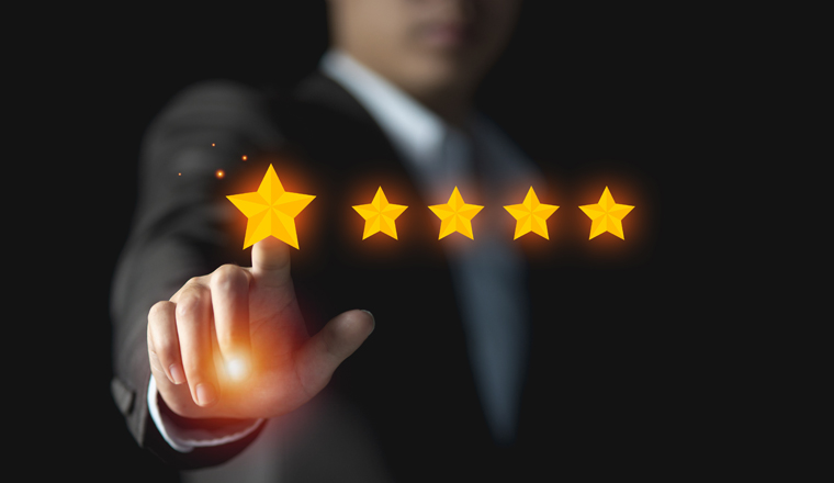 Businessman give rating to service experience, User Experience concept, Customer review satisfaction feedback survey, Customer giving a Five Star to business ranking