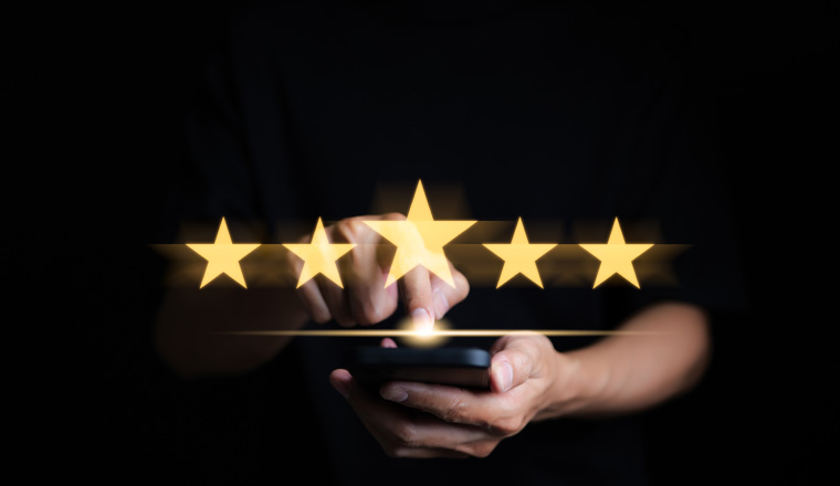 Customer review satisfaction feedback survey concept. User give rating to service excellent experience on mobile phone application, Client evaluate quality of service reputation ranking of business.