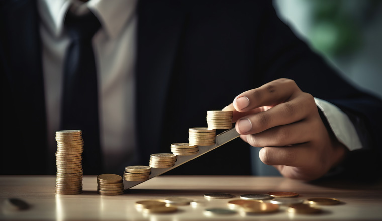  a man in a business suit is stacking coins with a wooden ruler on a table in front of a stack of gold coin stacks. . generative ai