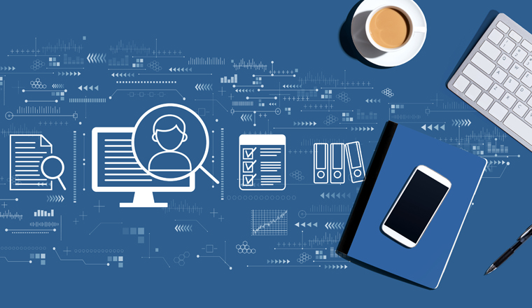 Document management system concept with a computer keyboard and office items