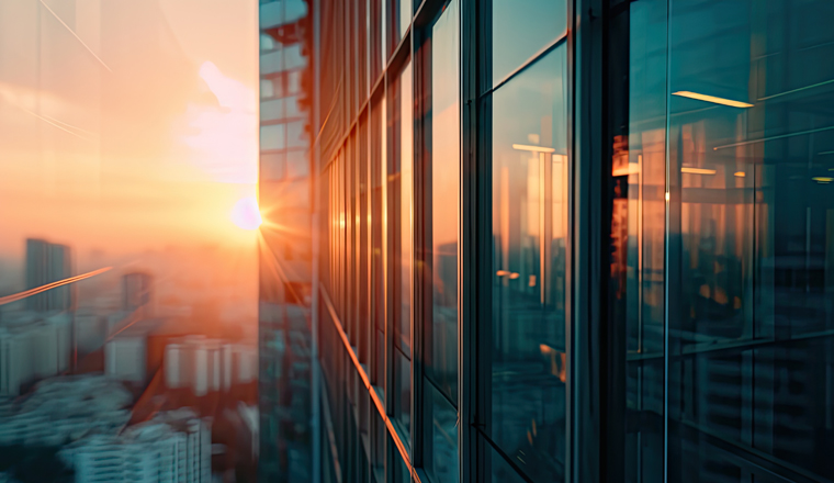 Urban skylines at sunset. Stunning image captures essence of modern cityscape showcasing dynamic interplay of architecture business and life. Towering skyscrapers dominate symbolizing city economic and contemporary design