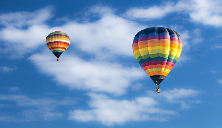 Hot air balloon over blue sky