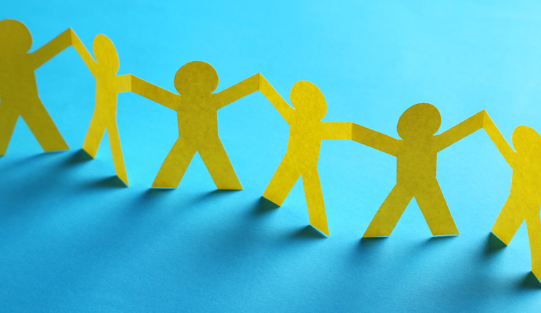 Paper people on the blue paper background