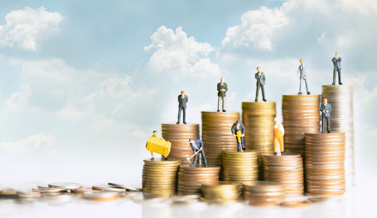 Miniature people standing on stack of coins. Inequality and social class. Income and economic inequality concept. Inequality in social class, ideology, Gender, Racial and ethnic and health.
