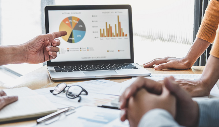 Business team collaboration discussing working analyzing with financial data and marketing growth report graph in team, presentation and brainstorming to strategy planning making profit of company.