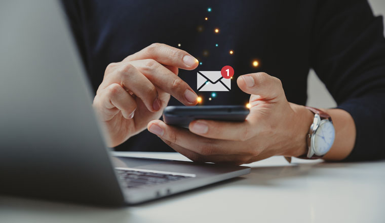 Hand of businessman using smartphone for email with notification alert, Online communication concept.