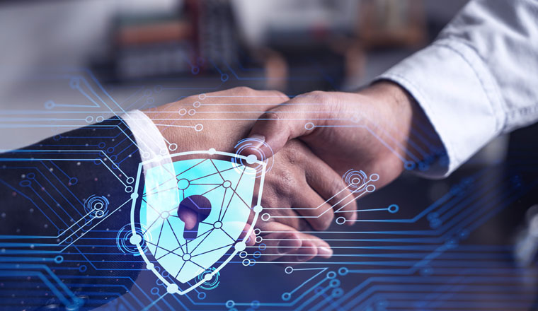 Handshake of two businesspeople who are negotiated the project to protect cyber security of international company. Padlock Hologram icons. Woman in business.