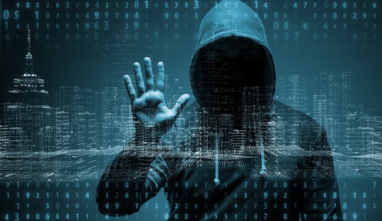 Young hacker in data security concept