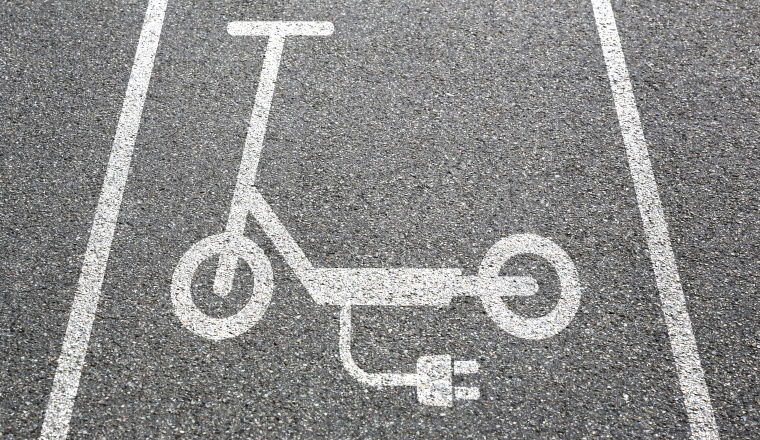 Electric scooter e-scooter lane path way road sign eco friendly mobility transport