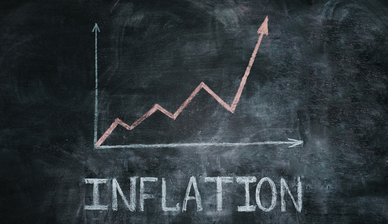 Graph of inflation in white chalk on a black chalkboard