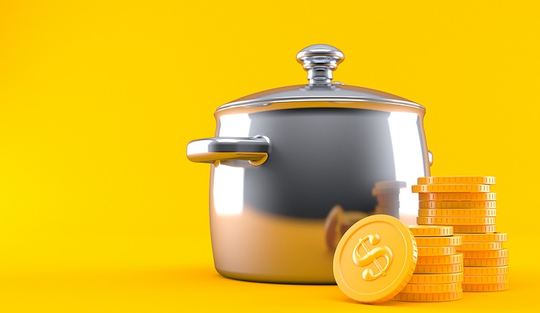Kitchen pot with stack of coins